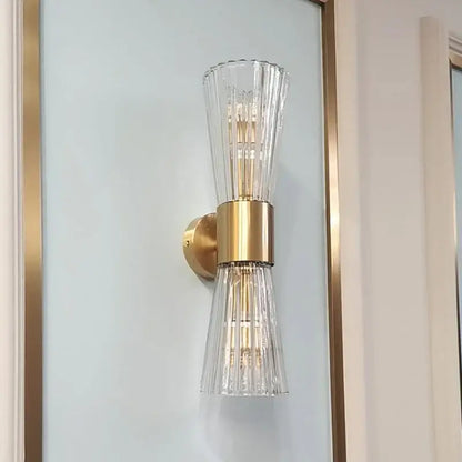 Modern gold stainless steel wall sconce with fluted clear glass shades for bedroom decorbites gold stainless design