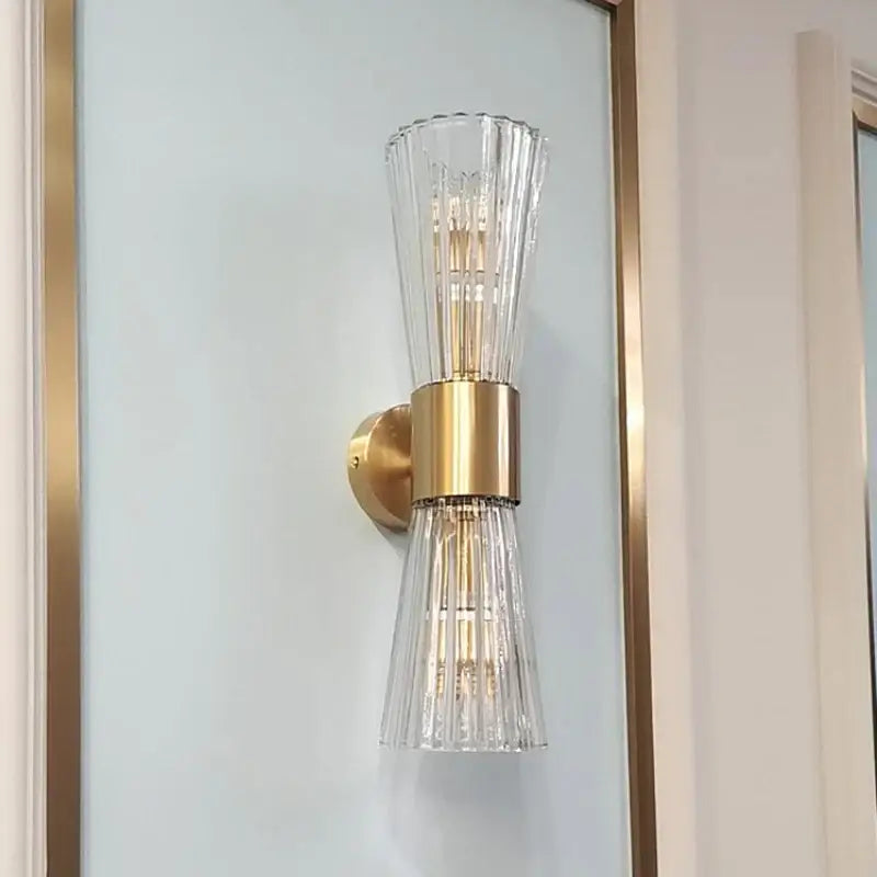 Modern gold stainless steel wall sconce with fluted clear glass shades for bedroom decorbites gold stainless design