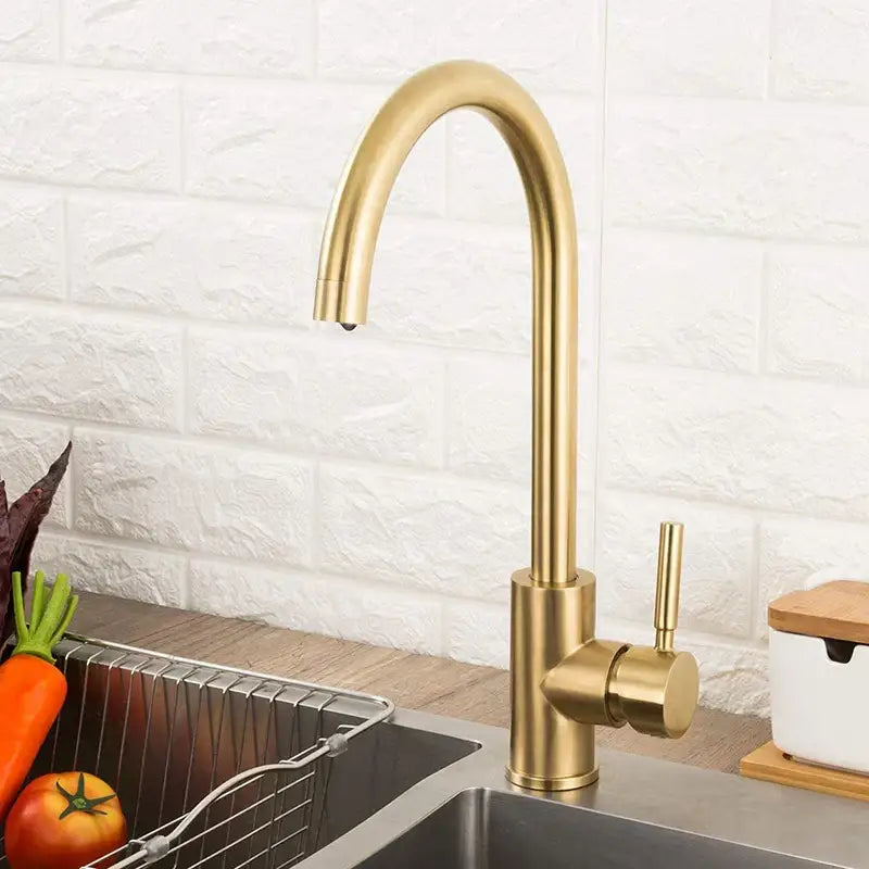 Modern gold stainless steel kitchen faucet with brass finish curved spout and single lever handle for sleek decorbites gold stainless design