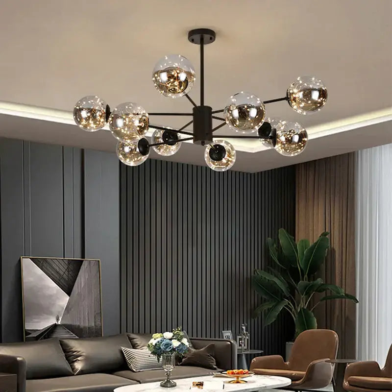 Modern black metal pendant light with multiple spherical glass globes reflecting warm light for dining room decorbites gold star glass chandelier