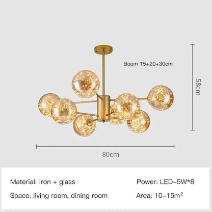 Modern gold star glass pendant light with gold-toned iron frame and multiple spherical glass globes for dining room decorbites gold star