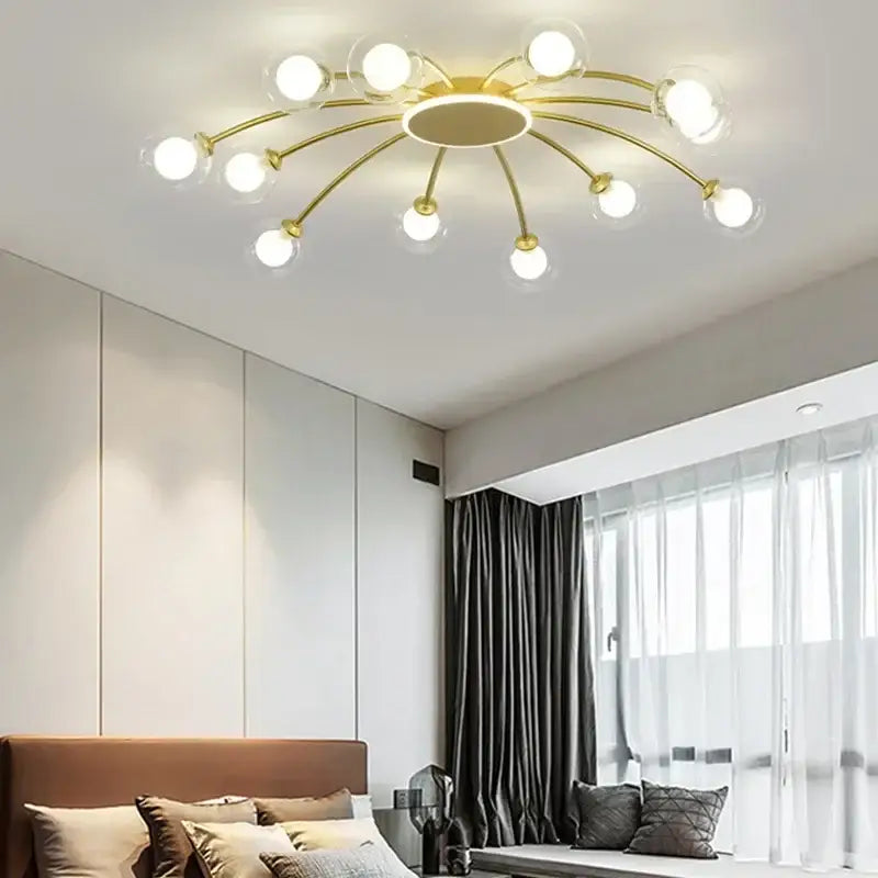 Modern gold starburst ball glass ceiling light with clear spherical bulbs and multiple arms for living room use