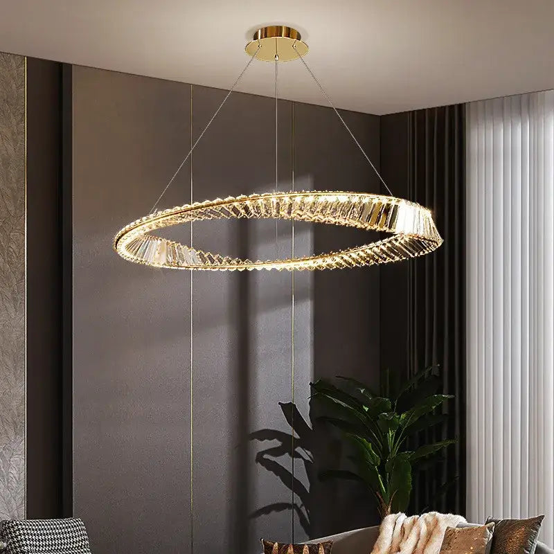 Modern gold steel rings pendant light with circular tiers of faceted crystals for dining room illumination