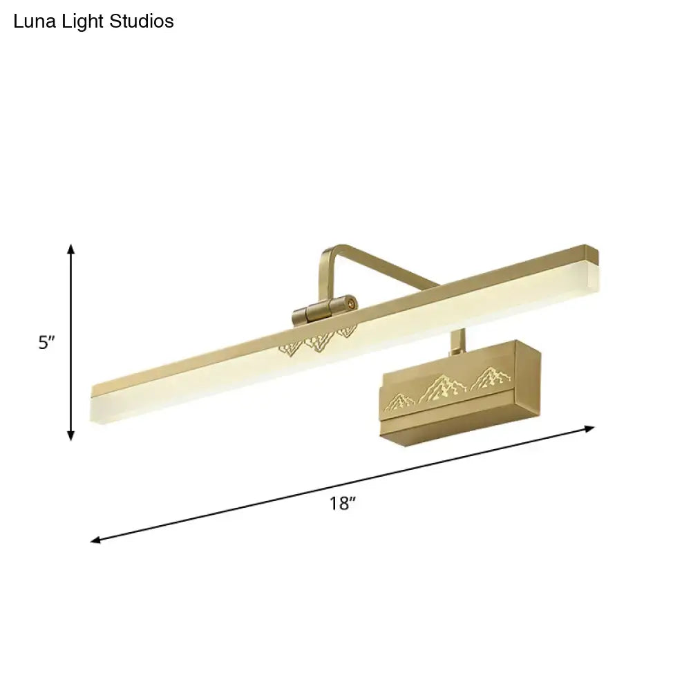 Modern gold swing arm wall sconce with a sleek tube metallic wall design and mountain silhouette etched base for bedroom use