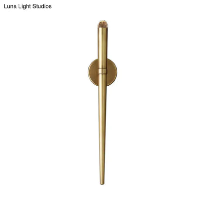 Modern gold tapered crystal led wall lamp with brass finish and circular mount for living room lighting