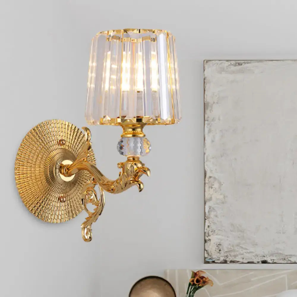 Gold tapered wall light fixture with crystal-encrusted fluted lampshade and ornate dragon-head arm for bedroom sconce