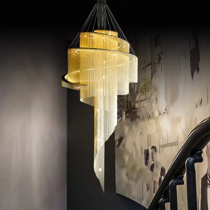 Modern gold tassel led chandelier featuring tiered gold design with cascading crystal strands for elegant living room decorbites gold tassel