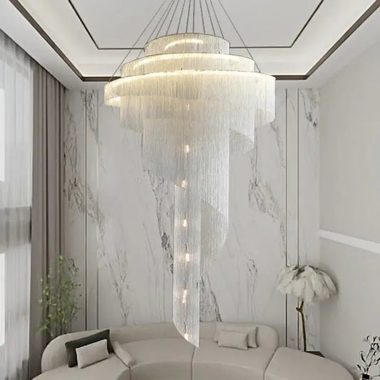Modern gold tassel led chandelier featuring cascading translucent crystal strands with warm embedded lights for living room decorbites gold tassel