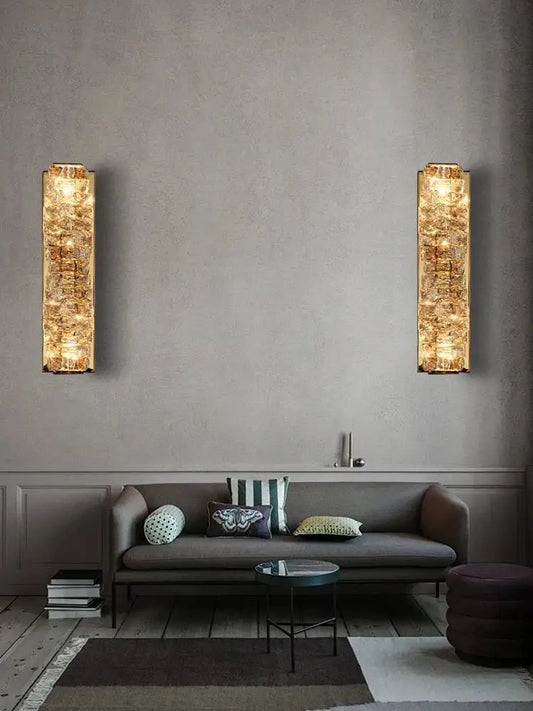 Modern gold textured glass wall sconce lamps with a sleek design for stylish bedroom decor and ambient lighting