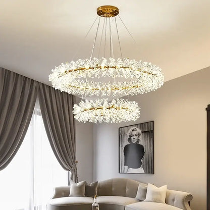 Modern gold three tier crystal led chandelier with gold metal frames and cascading clear crystals for dining room decorbites crystal led