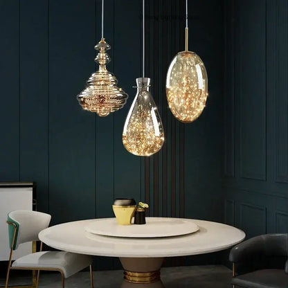 Modern gold tiered crystal pendant light with elegant glass and metallic fixtures for dining room and modern interiors