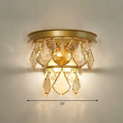 Modern gold tiered sconce light fixture with faceted teardrop crystals bedside wall mount for bedroom use