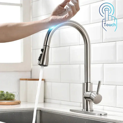 Modern gold touch control sink tap with a stainless steel curved spout and pull-down spray head for kitchen use