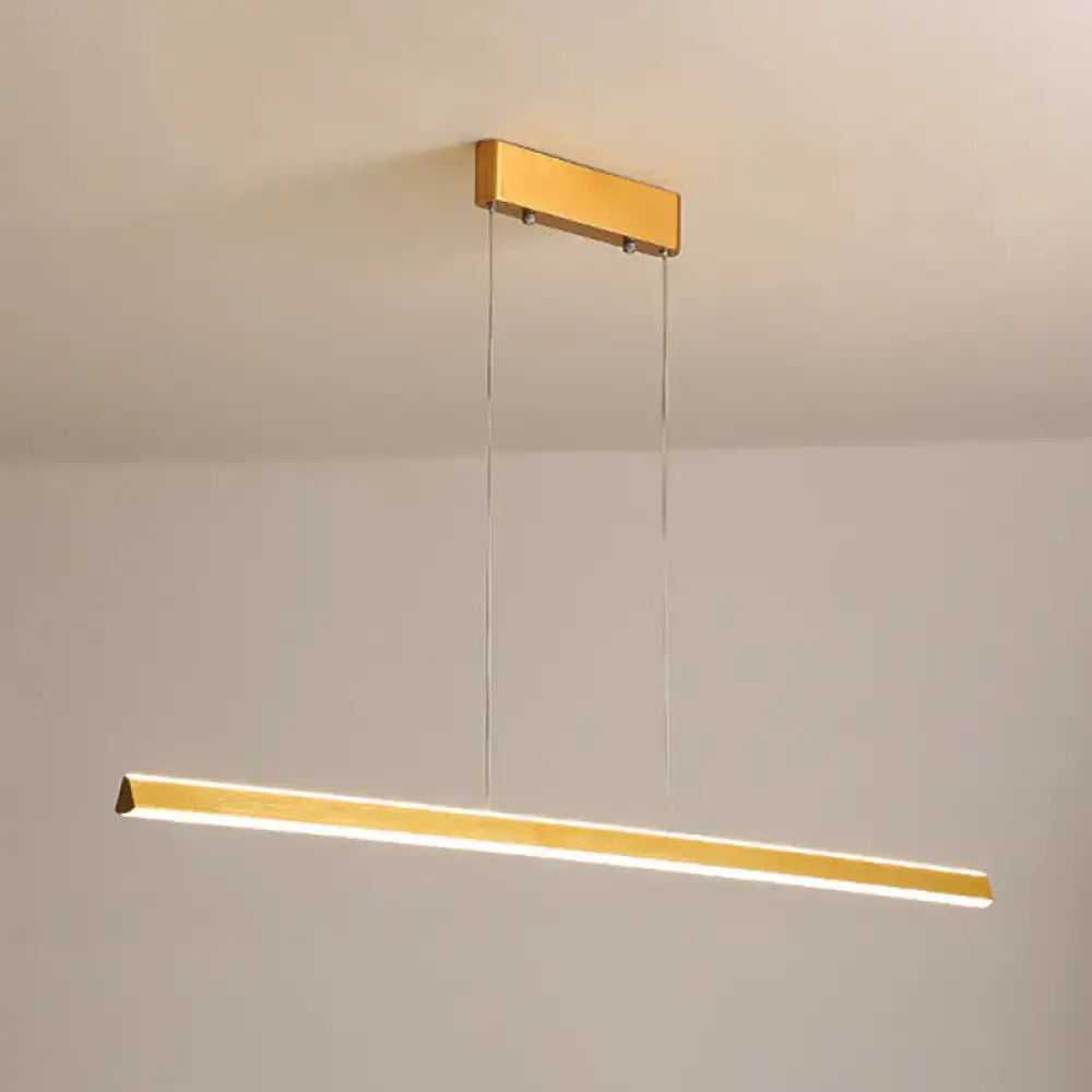 Gold-finished aluminum triangular prism pendant lamp with sleek rectangular design for dining room lighting