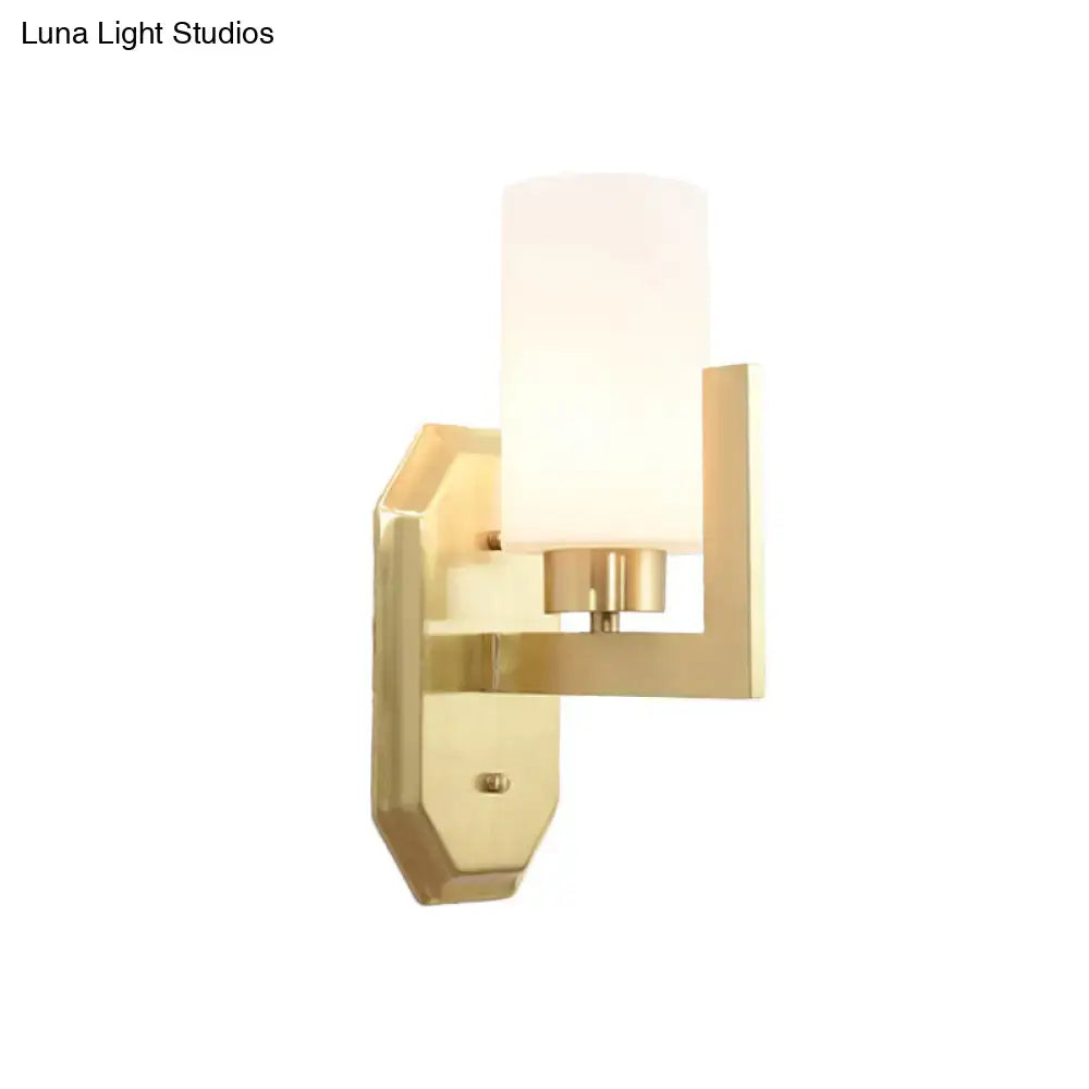 Modern gold tubular wall lamp with frosted glass cylinder shade product fixture for living room lighting