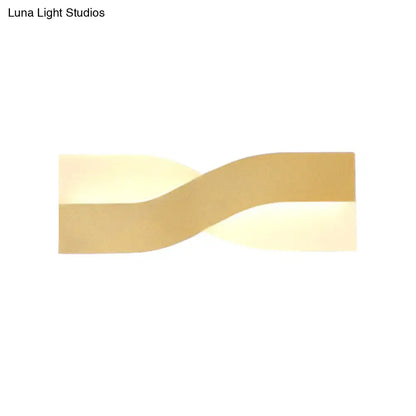 Modern gold-toned twisted wall lamp with sleek design and fixture width 8in for 110v-120v 220v-240v use