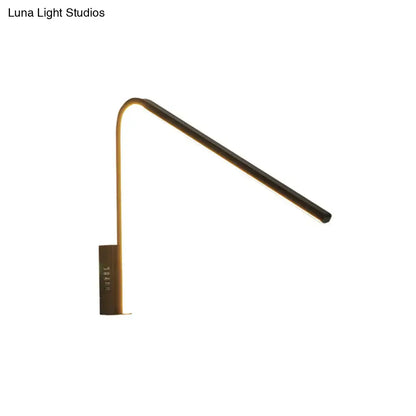 Modern gold v-shaped led sconce with warm white light and silica gel featuring a sleek curved arm design