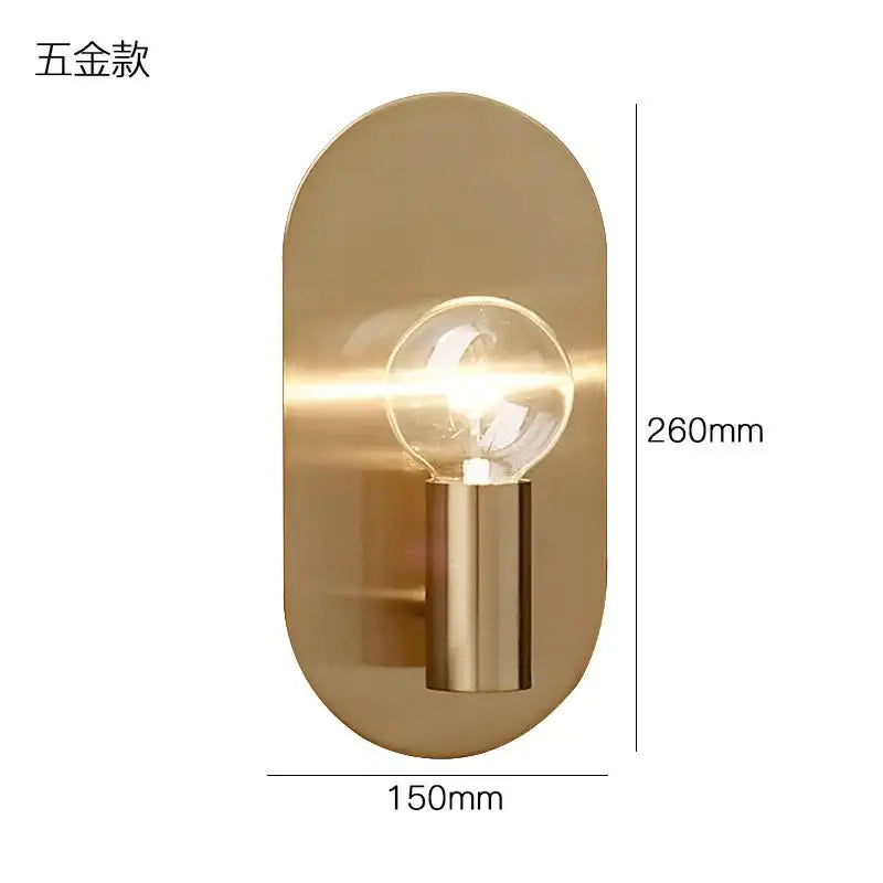 Modern gold wall lamp sconce with brass-finished oval design and exposed filament bulb for bedroom decorbites gold wall lamp
