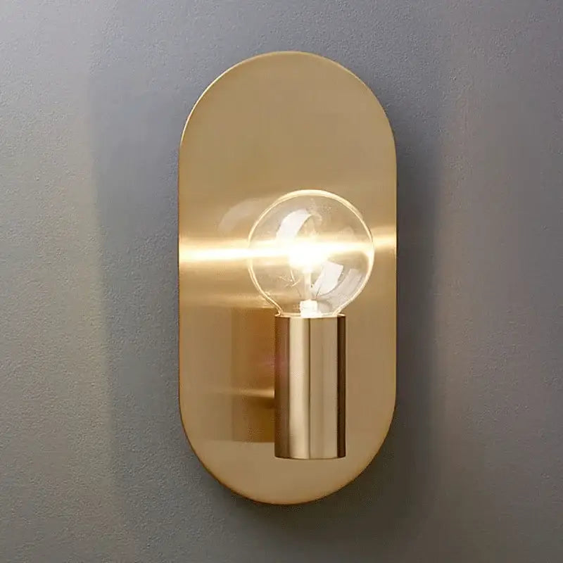 Modern gold wall lamp sconce with brass oval design and clear filament bulb for stylish bedroom decorbites gold wall lamp