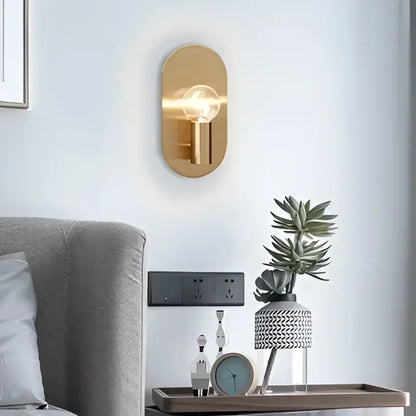 Modern gold wall lamp sconce with oval design and visible filament bulb ideal for bedroom decorbites gold wall lamp