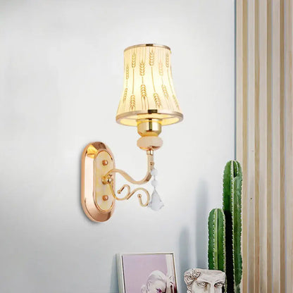 Modern gold wall lamp with arc wheat patterned glass, cream lampshade, and crystal accent for bedroom sconce lighting