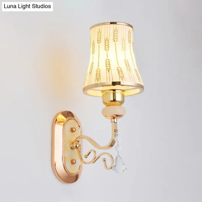 Modern gold wall lamp with arc wheat patterned glass cream lampshade and crystal accent for bedroom sconce lighting
