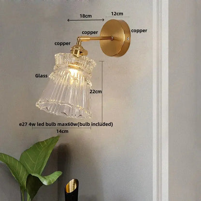 Modern gold wall lamp with clear glass shade brass-finished arm and pull chain for bedroom decorbites clear glass
