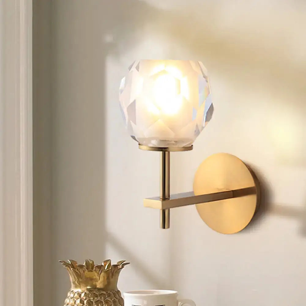 Modern gold wall lamp with faceted globe shade wall mounted light ideal for hallway lighting fixture
