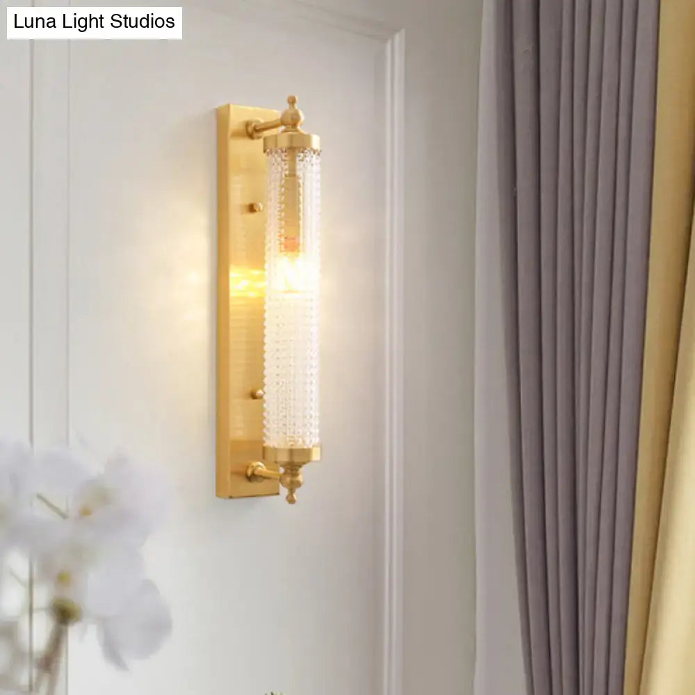 Modern gold wall light fixture with textured clear glass cylinder direct wired electric 220v-240v for living room
