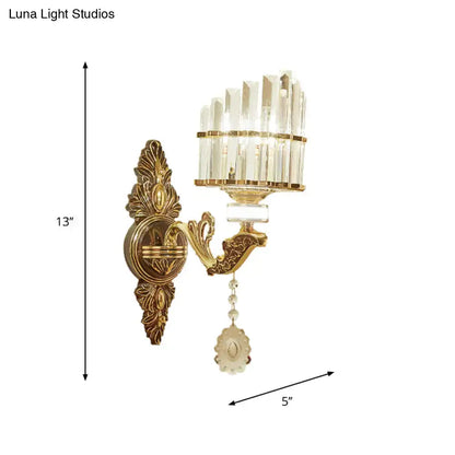 Modern gold wall mount light arc sconce with gold-toned ornate design and clear crystal accents for bedroom use