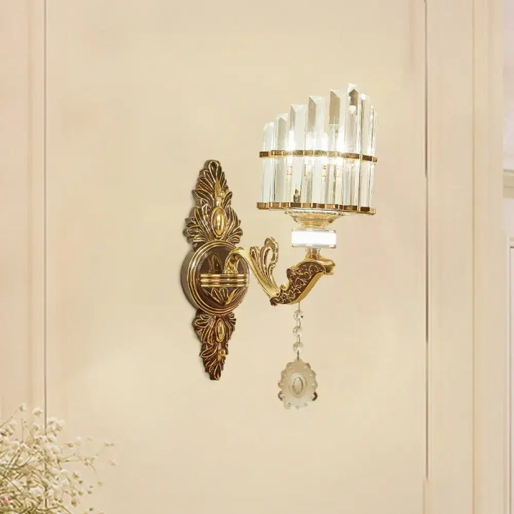Modern gold wall mount light arc sconce with gold tone ornate design crystal accents and dangling decorative pendant