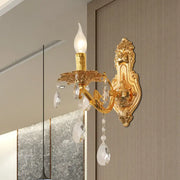 Modern gold wall sconce with crystal drops ornate design and e12 e14 candle-style bulb for bedroom lighting