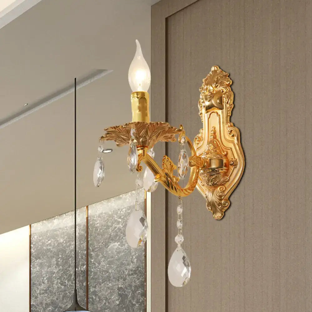 Modern gold wall sconce with crystal drops ornate design and e12 e14 candle-style bulb for bedroom lighting