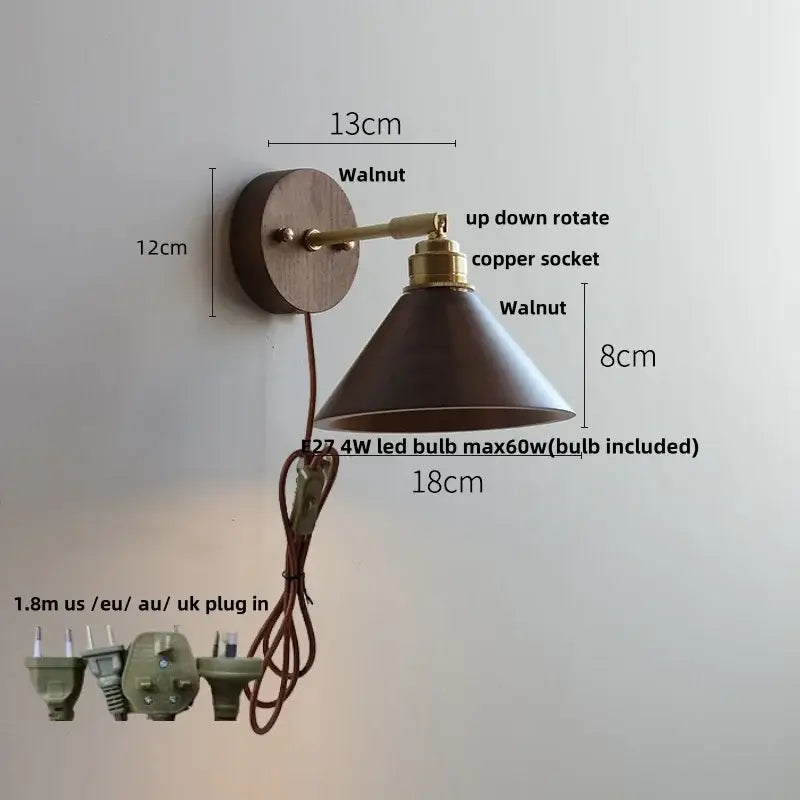 Modern gold walnut wall sconce with pull chain switch featuring a walnut wood base, conical shade, and brass hardware
