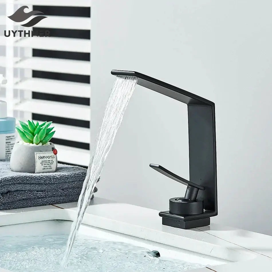 Black matte waterfall basin faucet by decorbites with sleek modern design and brushed metal finish for bathroom decor