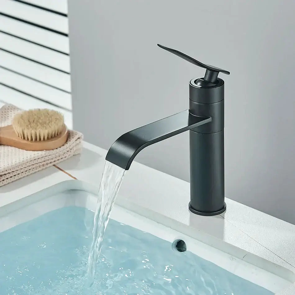 Modern matte black waterfall basin faucet with sleek minimalist design by decorbites basin faucet for bathroom decor