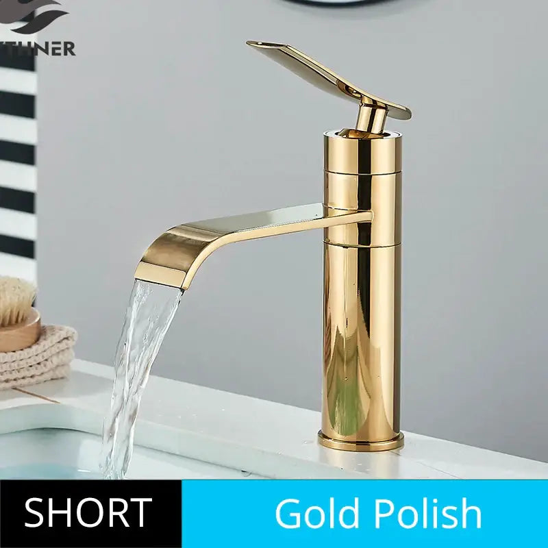 Modern gold waterfall basin faucet with gold-polished cylindrical body and curved spout by decorbites basin faucet