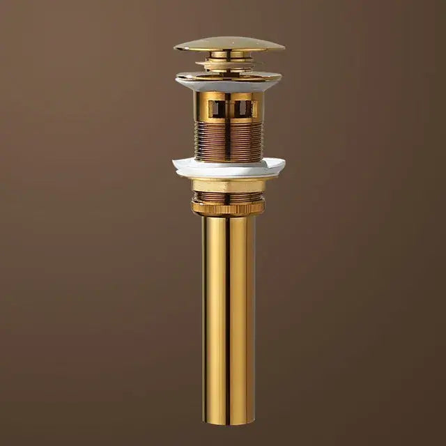 Modern gold waterfall basin faucet bathroom mixer tap featuring a gold-toned sink drain with decorative ridged sections