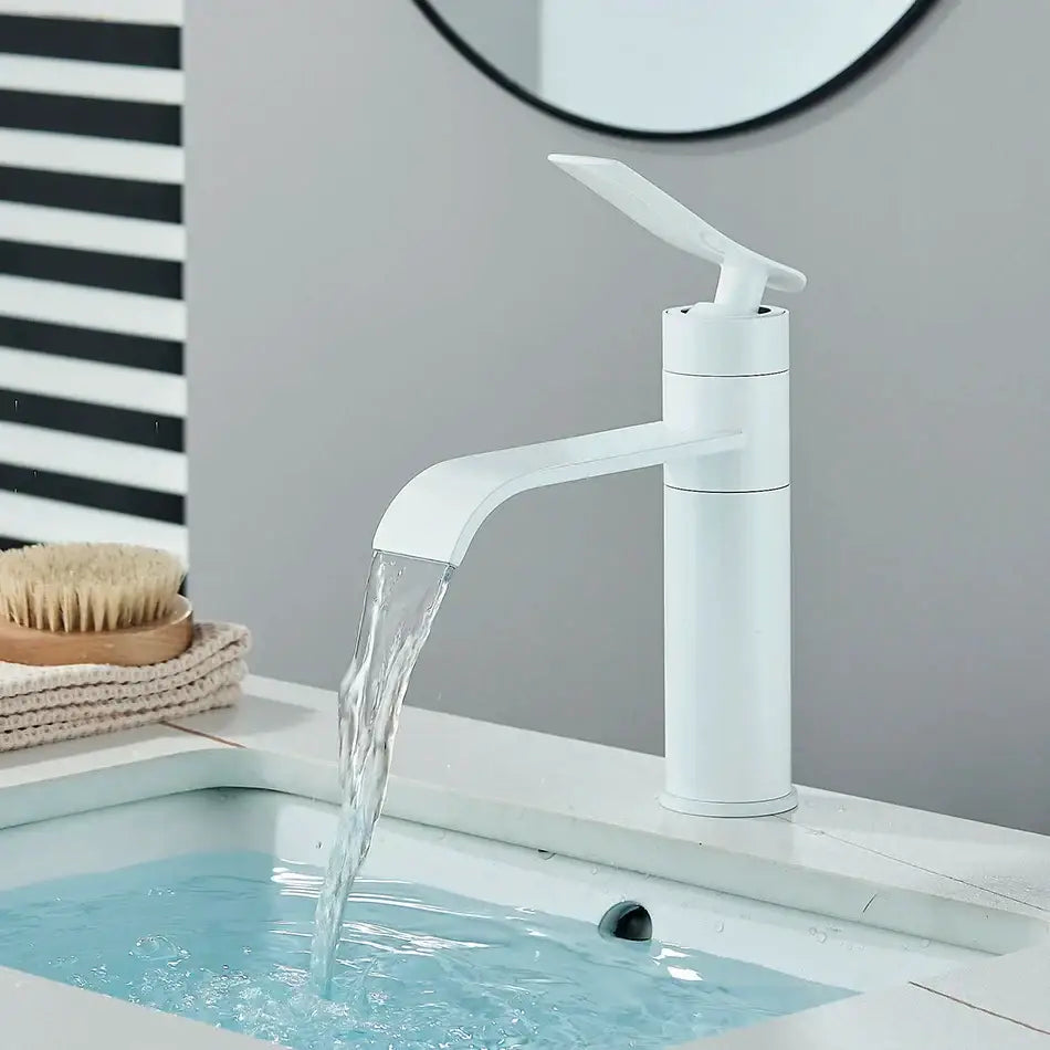 Modern white ceramic decorbites basin faucet with sleek minimalist design and waterfall spout for bathroom use