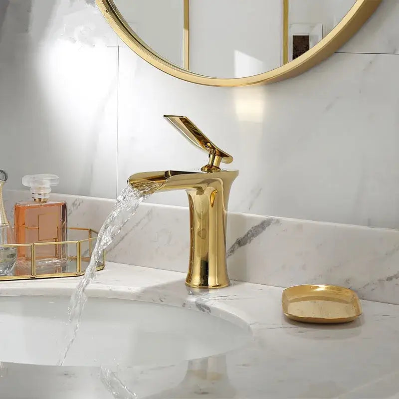Modern gold waterfall basin faucet with sleek design and single lever tap by decorbites gold for bathroom use