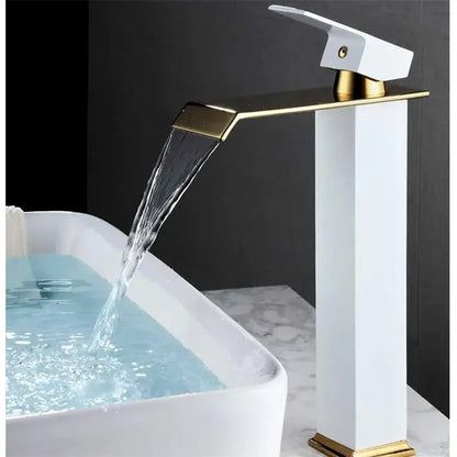 Modern gold waterfall basin faucet with sleek white ceramic body and polished gold accents cascades water elegantly