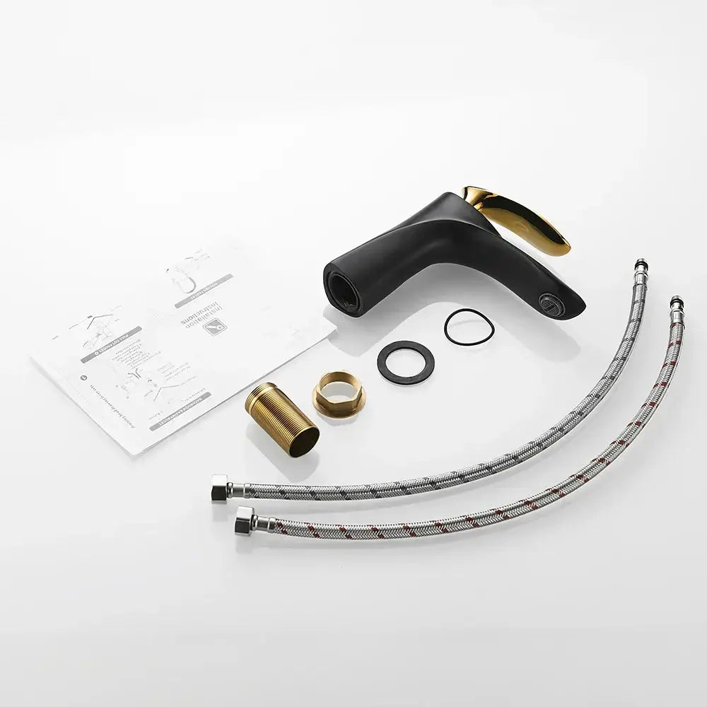Modern gold waterfall bathroom faucet with sleek black body, gold accents, and braided metal hoses for decorbites gold waterfall use
