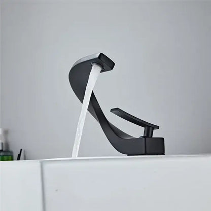 Modern black matte finish faucet with sleek curved spout and minimalist design for bathroom use