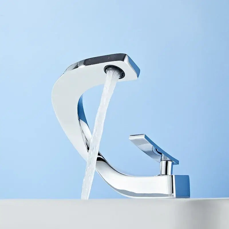 Modern gold waterfall mixer bathroom faucet with chrome finish, sleek curved design, and single lever handle