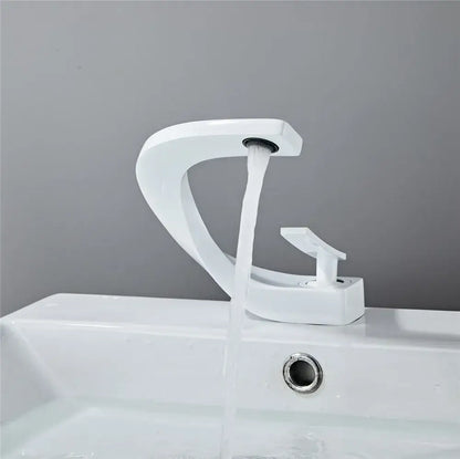 Modern gold waterfall mixer bathroom faucet with white sleek curved design and single handle in modern style