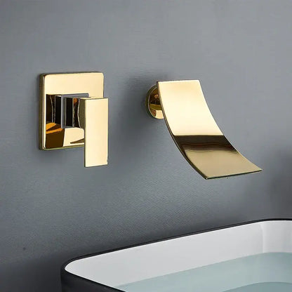 Modern gold waterfall wall mount faucet with gold-toned curved spout and square handle for bathroom basin decorbites gold waterfall