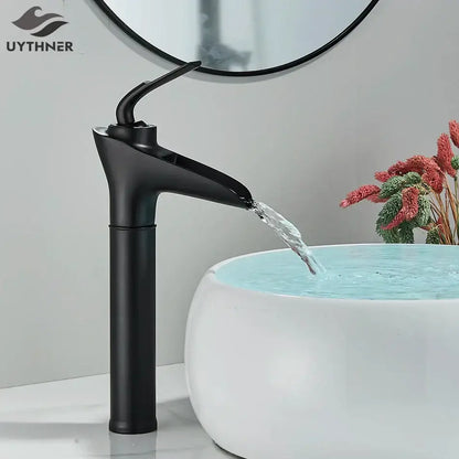 Black matte finish basin faucet with sleek modern design complementing decorbites gold waterfall wine glass basin faucet