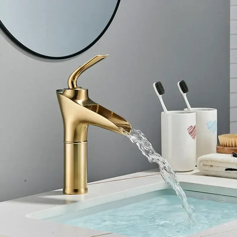 Modern gold waterfall wine glass basin faucet in gold tone with sleek and modern decorbites gold waterfall design