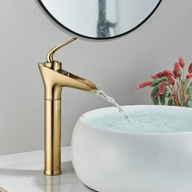 Modern gold waterfall wine glass basin faucet bathroom mixer with sleek gold-toned waterfall design by decorbites