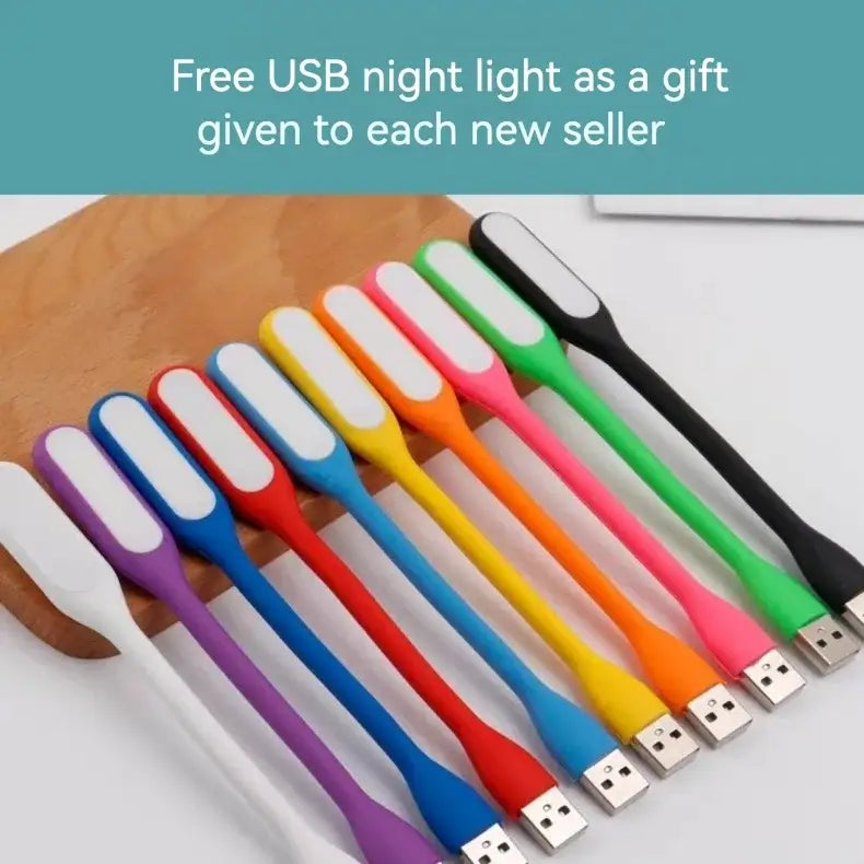 A set of colorful usb night lights with flexible silicone bodies and white illuminated panels complement a modern gold wave design pendant light